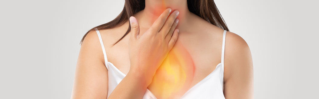 Woman Experiencing Acid Reflux