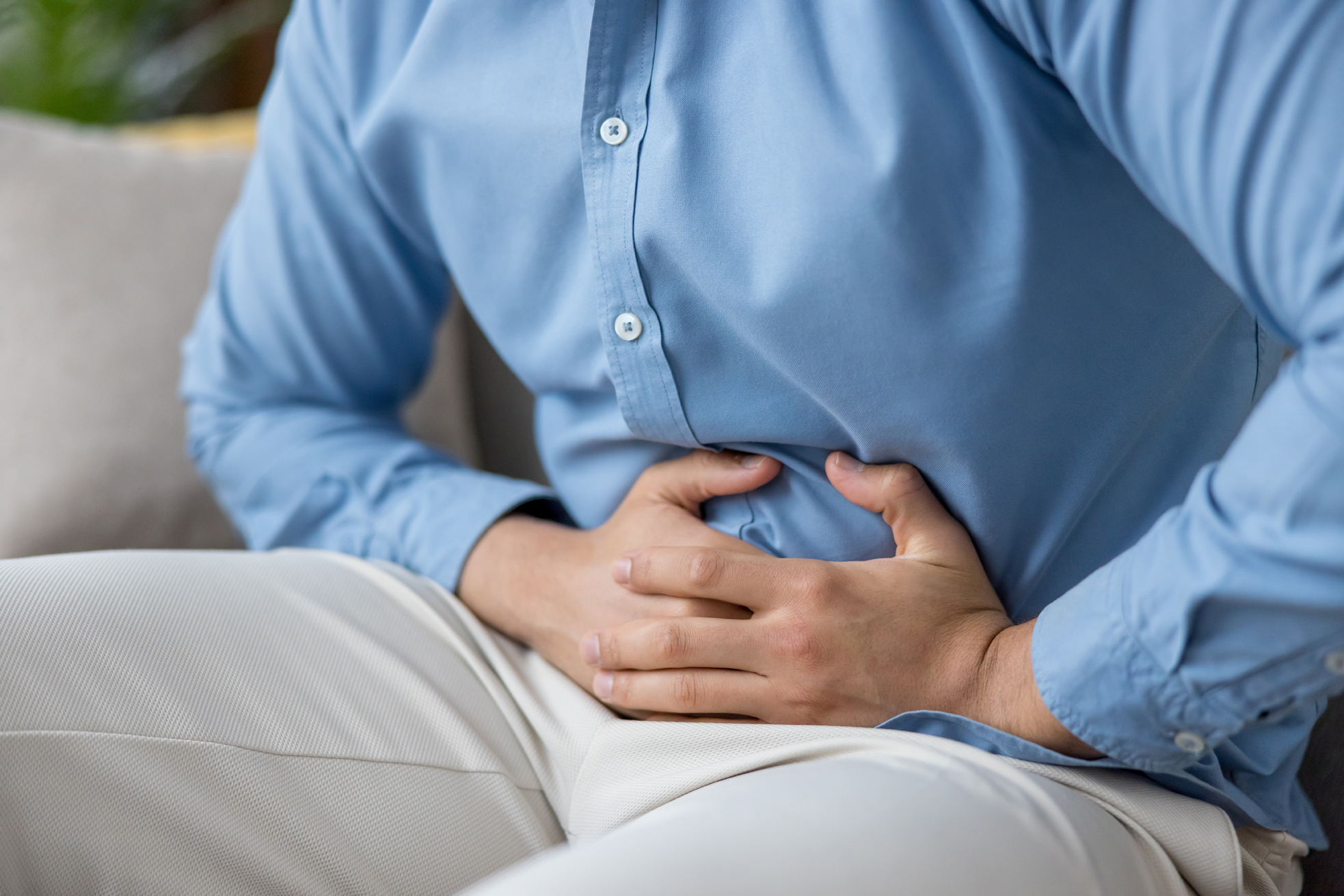 A man experiencing digestive discomfort