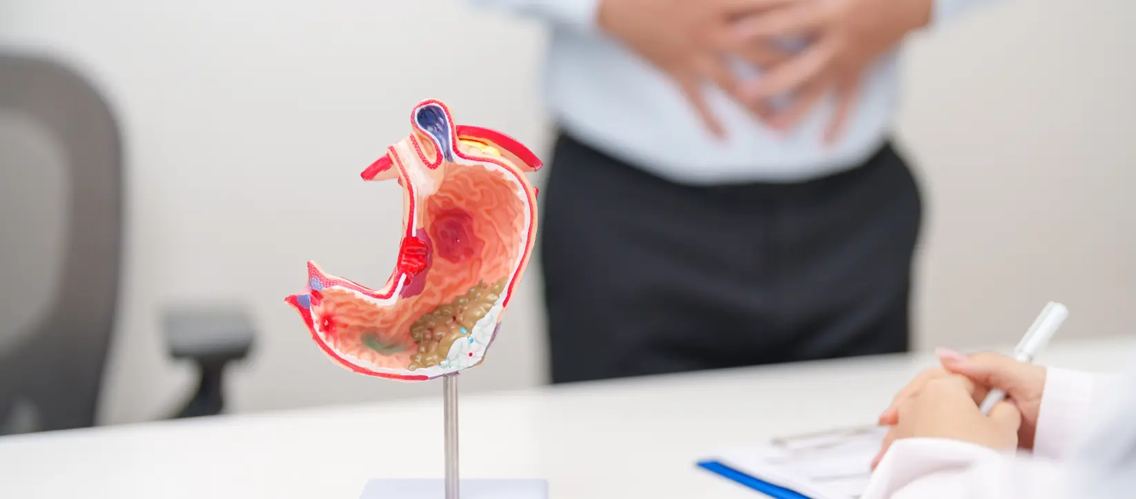 Patient consulting a gastroenterologist about GERD symptoms