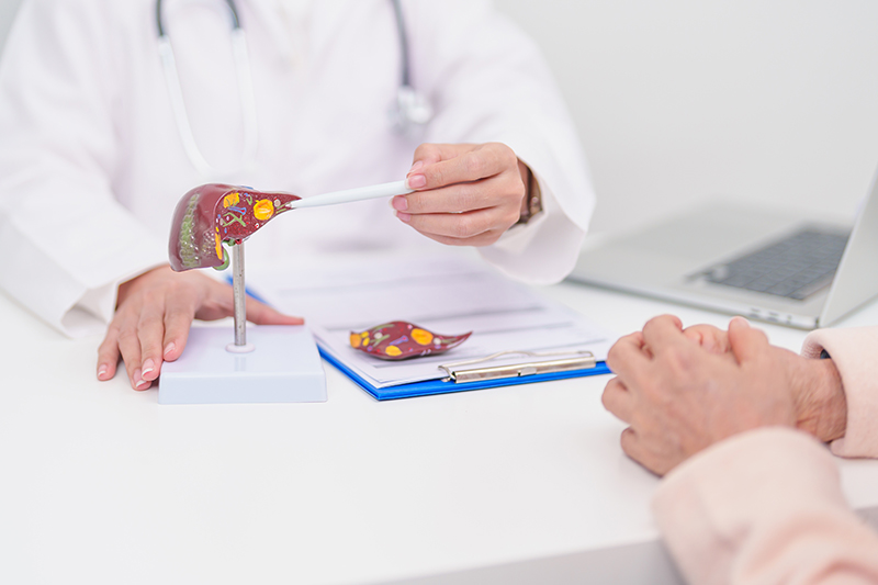A doctor providing a consultation for a liver condition
