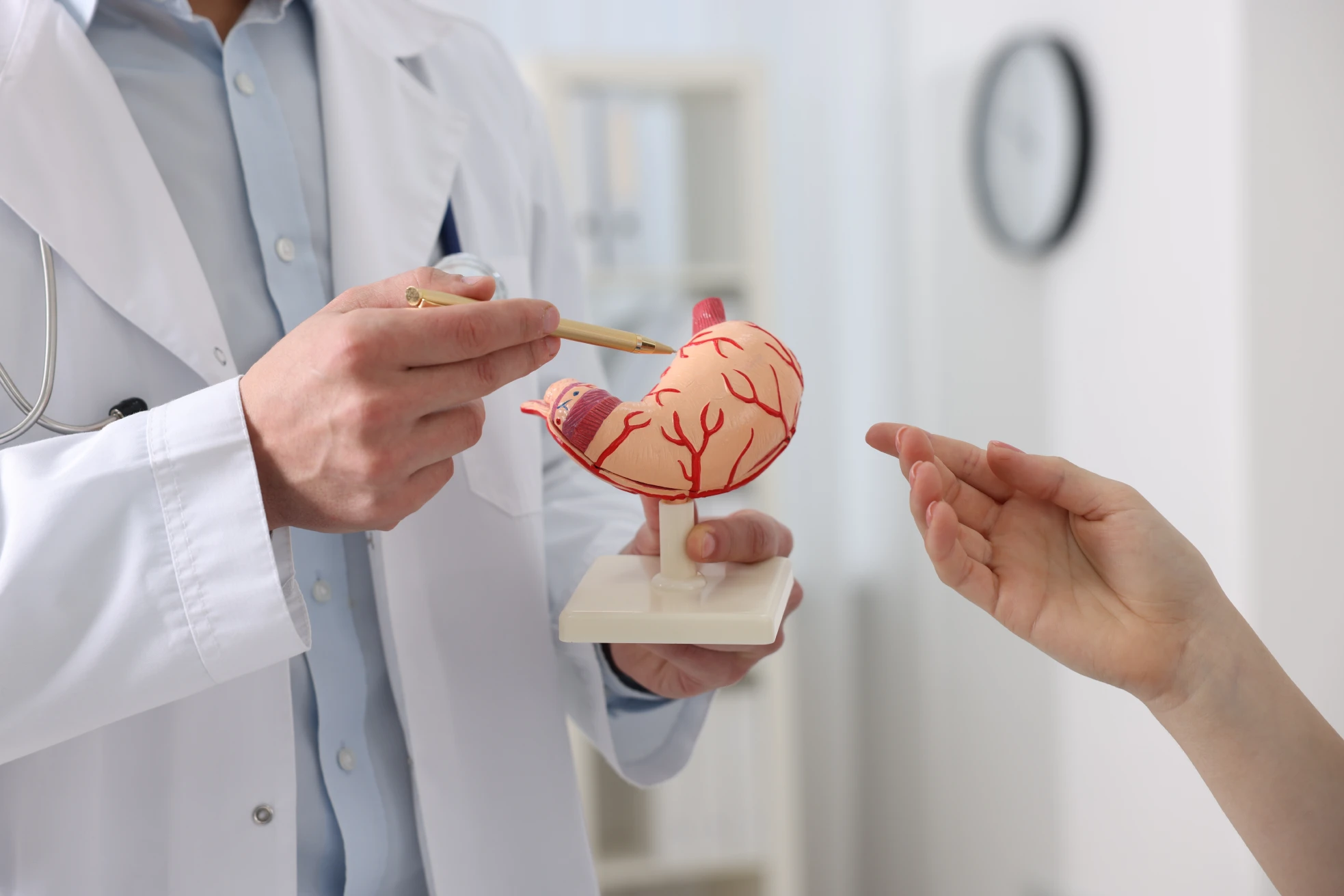 A gastro specialist in Singapore providing a consultation